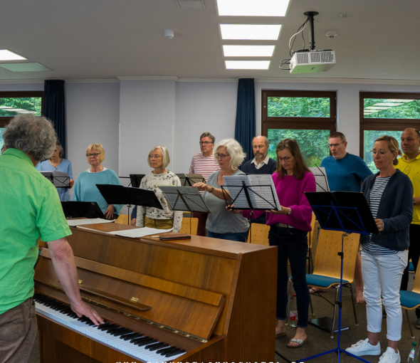 A choir group rehearsing in the rehearsal room Dillingen